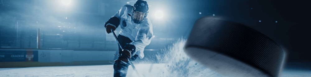 Hockey Player Hitting the Puck